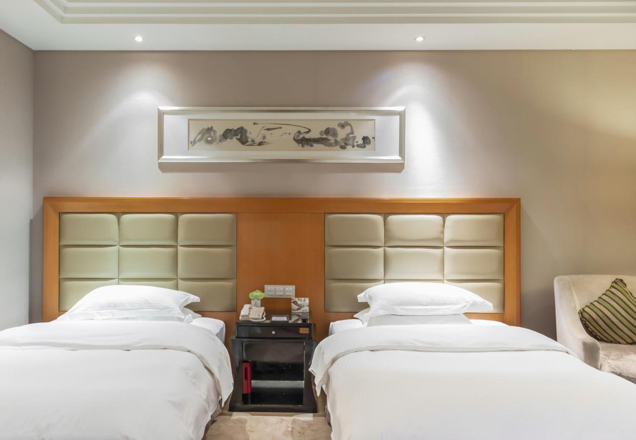Готель Wyndham Xinyang Downtown Екстер'єр фото